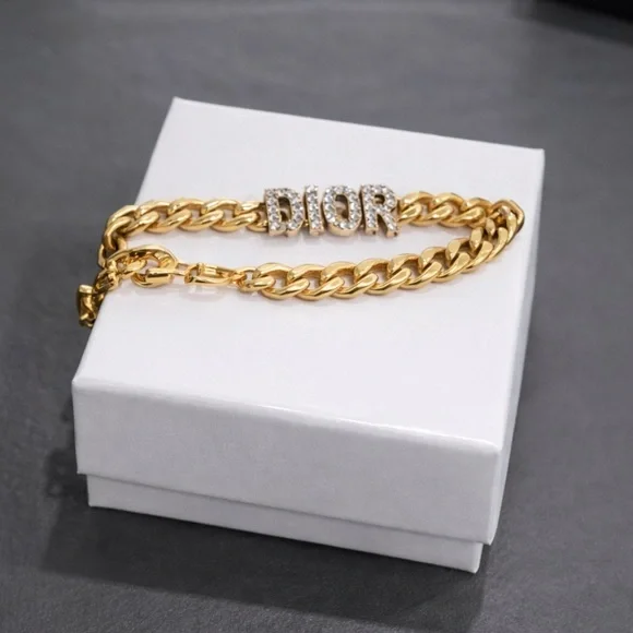 Christian Dior Gold Plated Crystal Logo Bracelet Curb Chain 6-8” Lobster Clasp - Picture 1 of 7